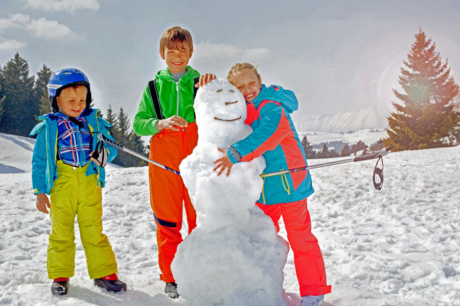children with snowman