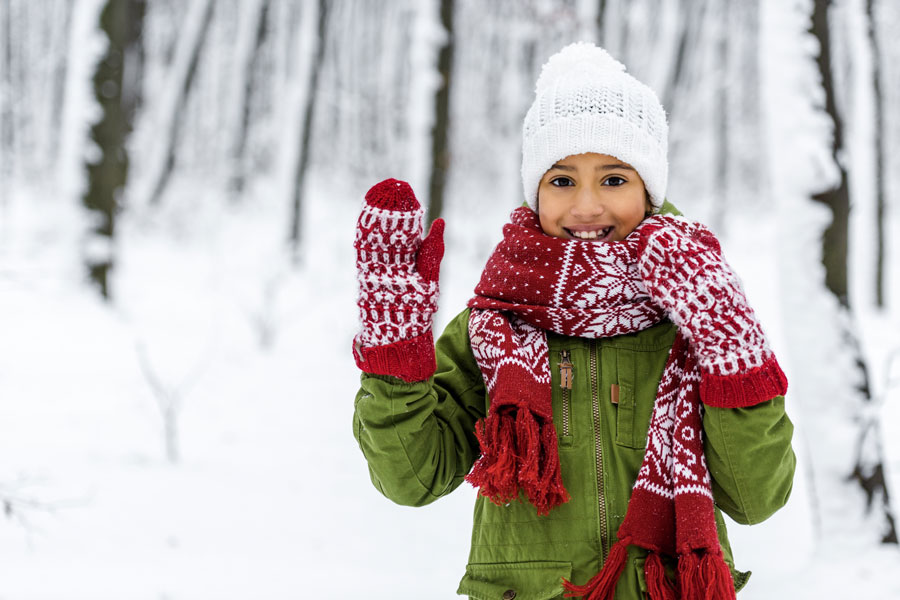 girl in warm snow clothes